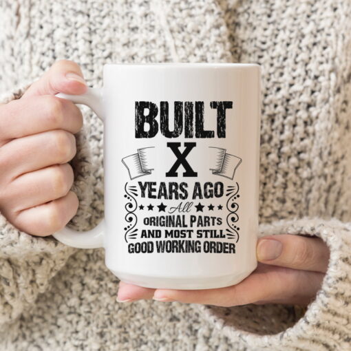 X-Built_15oz Woman in Sweater Holding Mug_MG_5476-SQ CROP-800